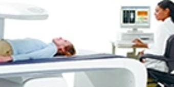 Person laying down on a hospital machine